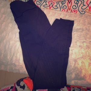 Lululemon Leggings with Mesh designs at bottom.